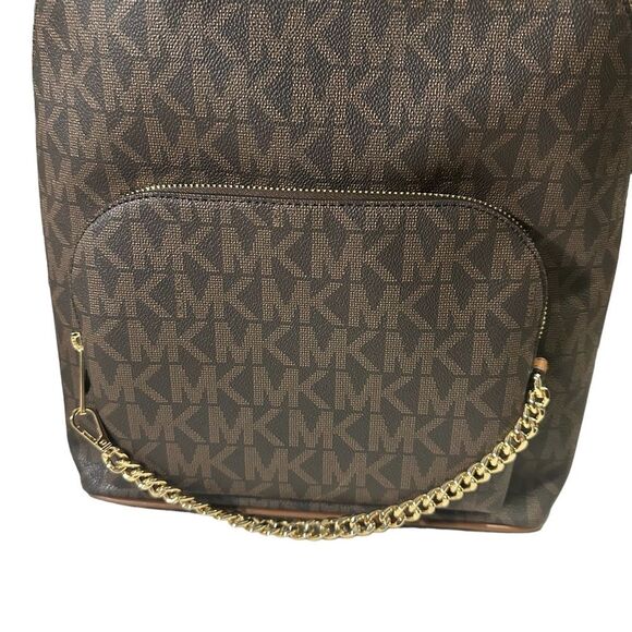 Michael Kors Mono-gram Canvas Jet Set
Backpack. Care tag included main image 5